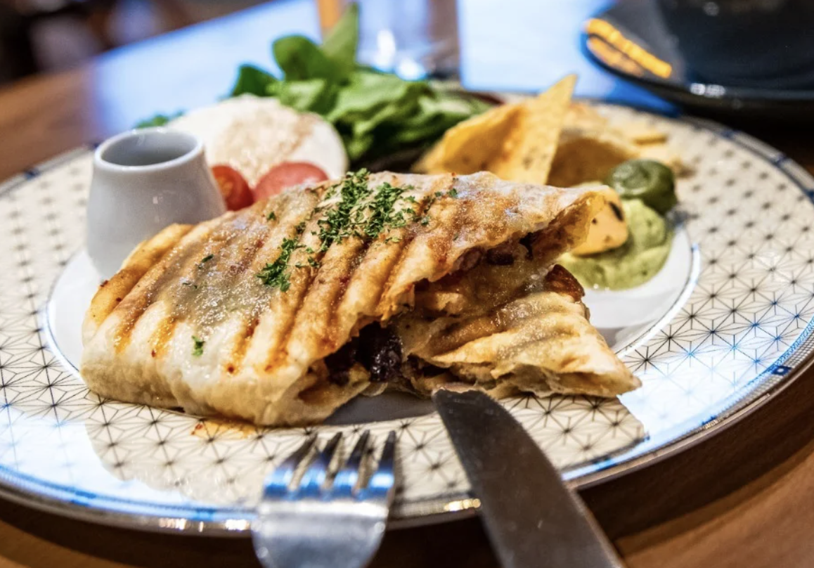Mexican Burrito with pork or chicken served with chips and guacamole at A Bunch of Coffee Tokyo